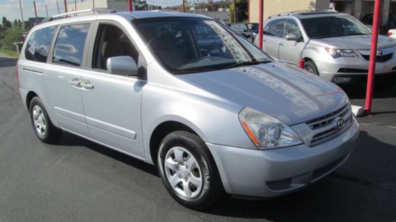 2009 Kia Sedona LX seven-seater priced at 7995 photo 1