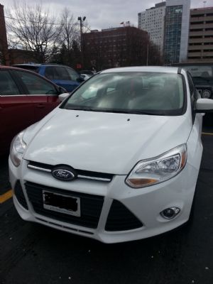 Graduation car sales 2012 white Focus hatchback photo 3