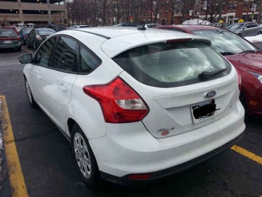 Graduation car sales 2012 white Focus hatchback photo 2