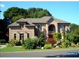 BEAUTIFUL SOLID BRICK CENTER HALL COLONIAL!